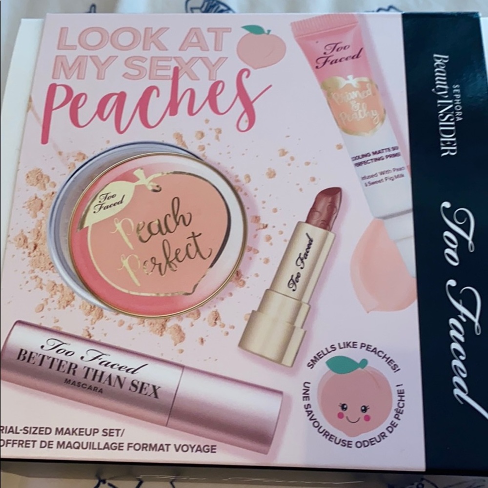 Too faced travel deluxe size makeup products.